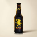 Royal Extra Stout bottle on a bone studio surface