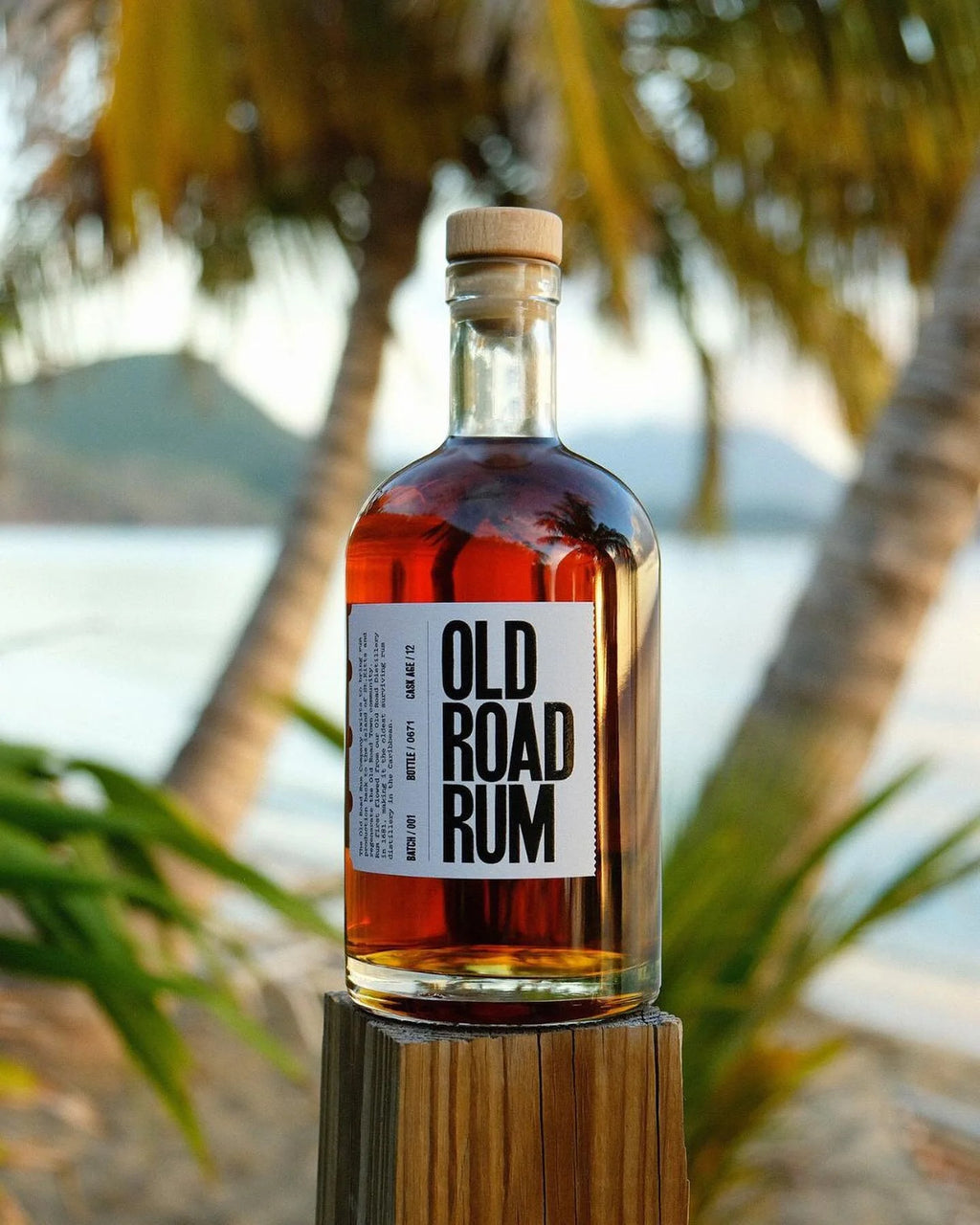 Old Road Rum 12-year, palm reflection in the glass